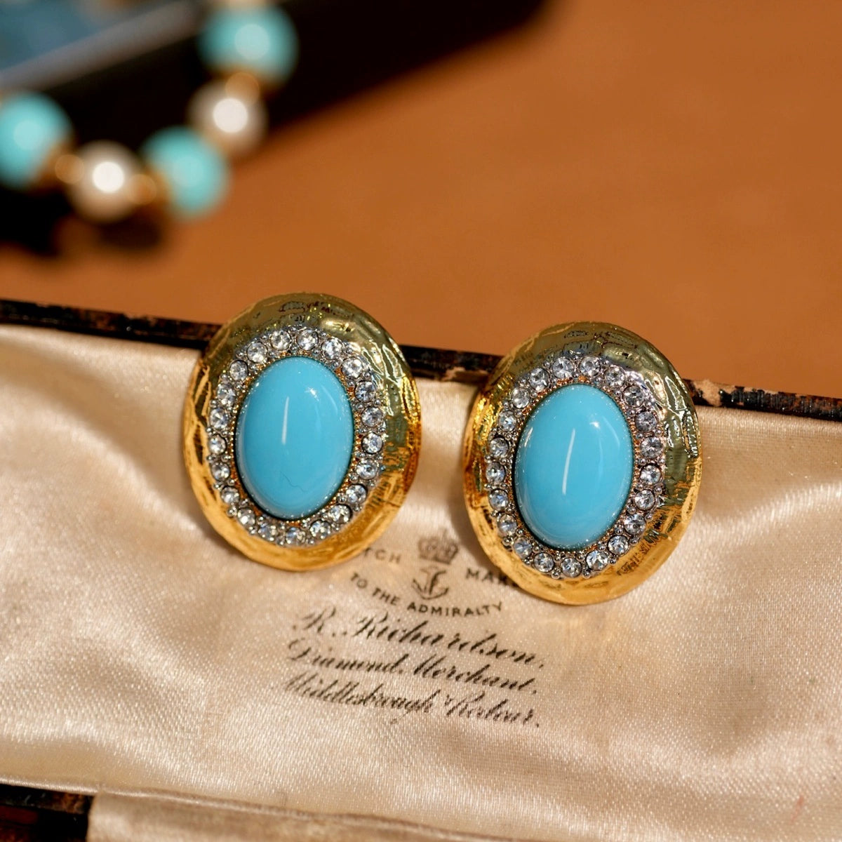 Light jewelry line "Hathor" retro gold and silver two-color gold-plated oval earrings turquoise blue retro hammered pattern